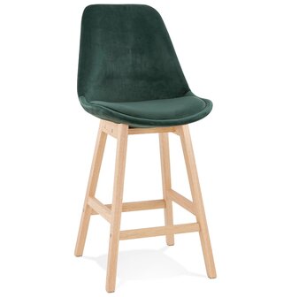 Halfhoge kruk &#039;MORISS MINI&#039; in fluweel groen met poten in natuurlijk hout