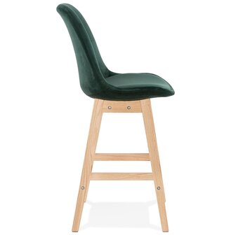 Halfhoge kruk &#039;MORISS MINI&#039; in fluweel groen met poten in natuurlijk hout