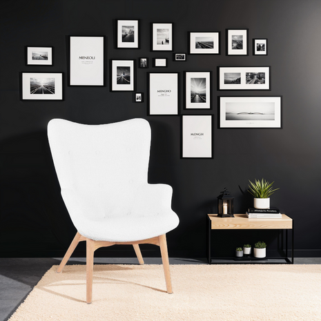 Scandinavische oorfauteuil 'TRAPEUR' van witte boucléstof