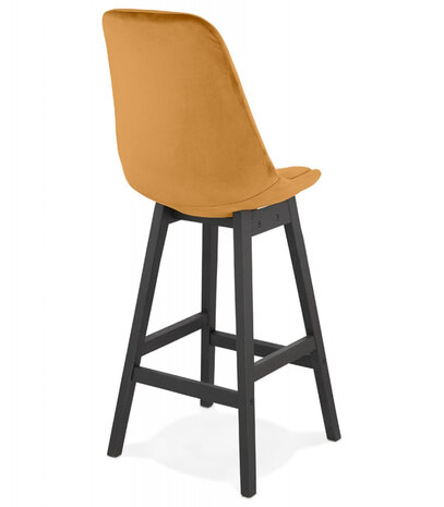 Halfhoge design barkruk 'MORISS MINI' in mosterd fluweel en poten in zwart hout
